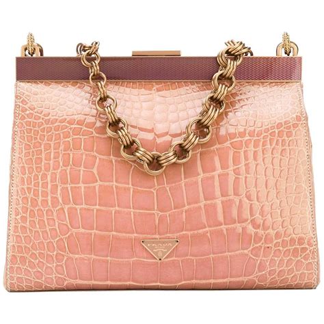 prada pink crocodile leather clutch|Prada clutch.